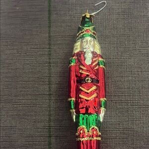 Festive Nutcracker Ornament in Red and Green